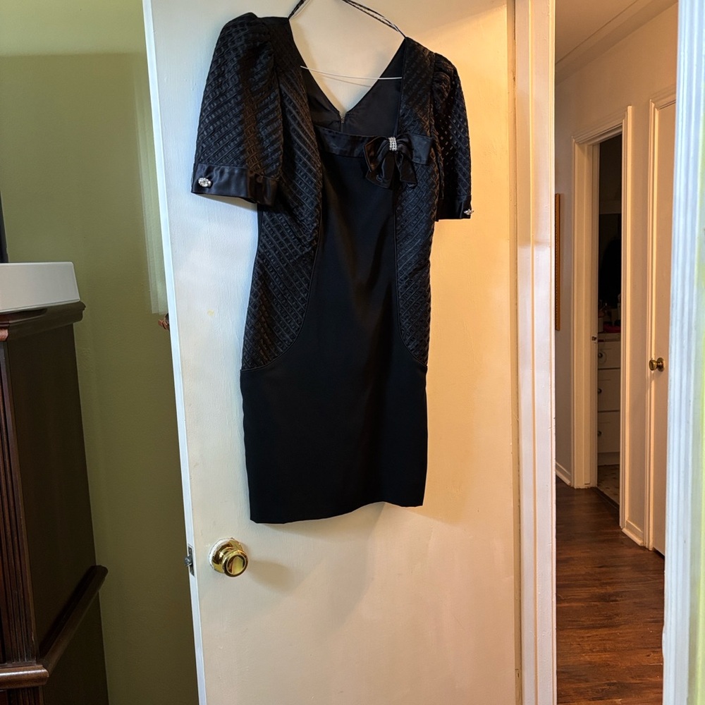 Chic Black Dress with Textured Sleeves